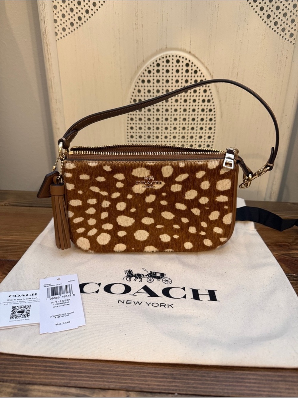 Coach Brown Spotted Haircalf Wristlet with Tassel new with tags